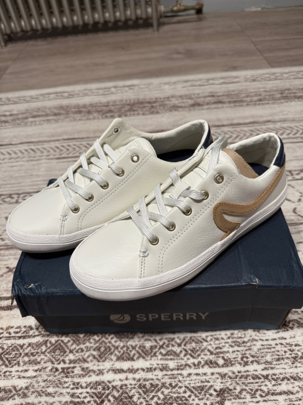 Sperry White Leather Sneakers with Tan Accent/Navy Heel
 New with tags Size 7.5W